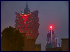 Grand Lisboa Hotel, Macau's tallest building, changing colours after dark.